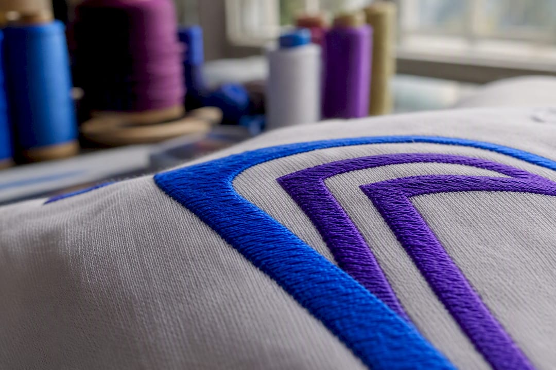 Detailed thread embroidery on knit fabric