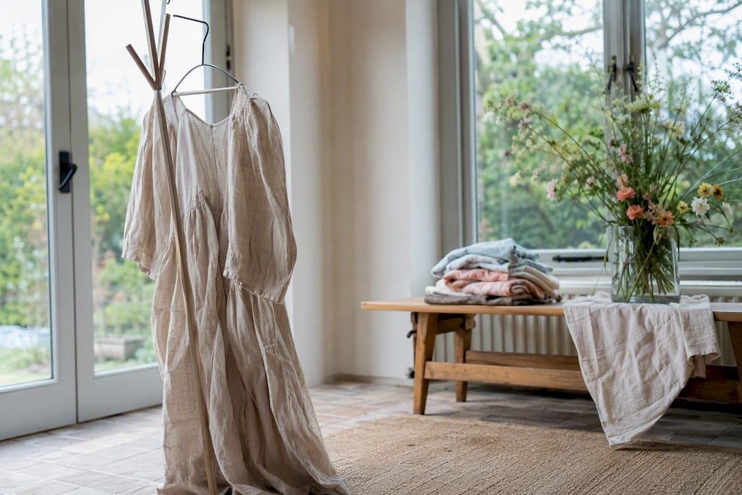 Wrinkled linen dress draped on chair