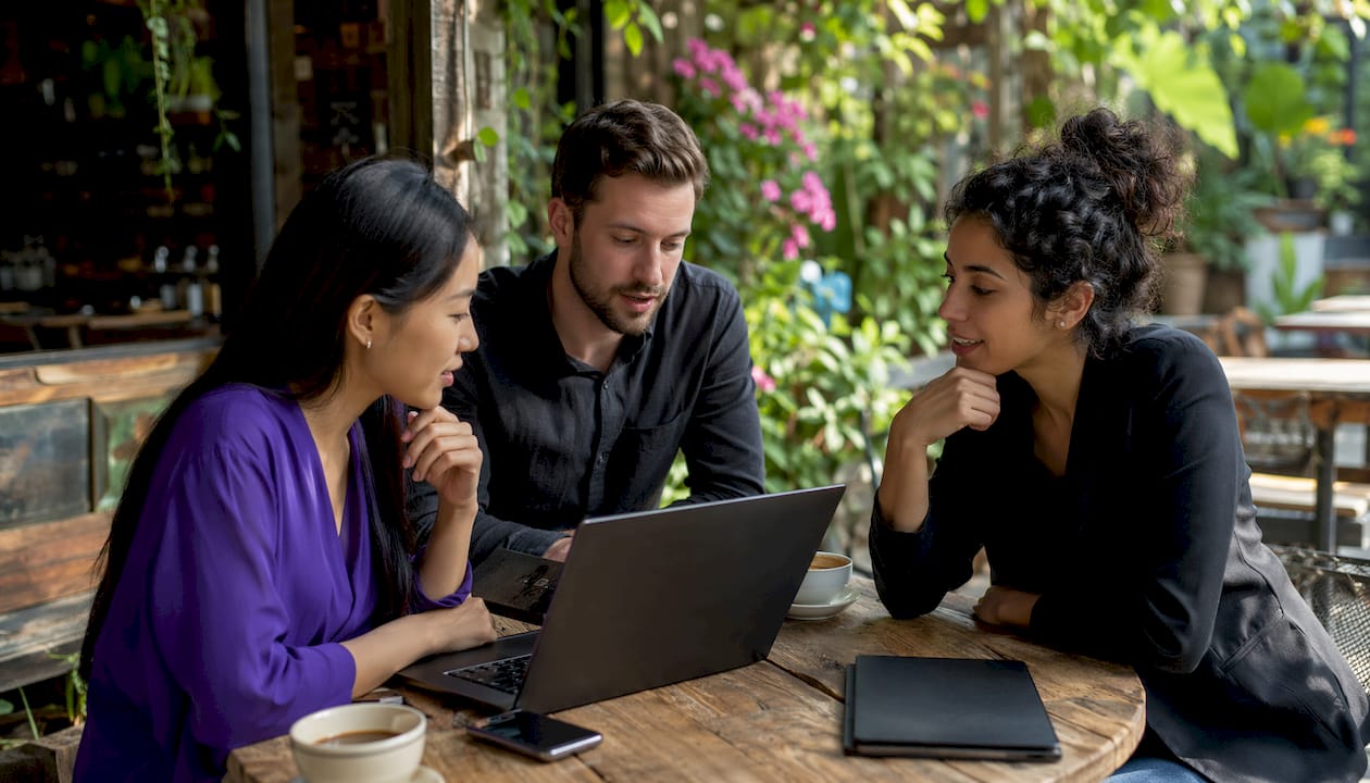 Team reviewing booking platforms together