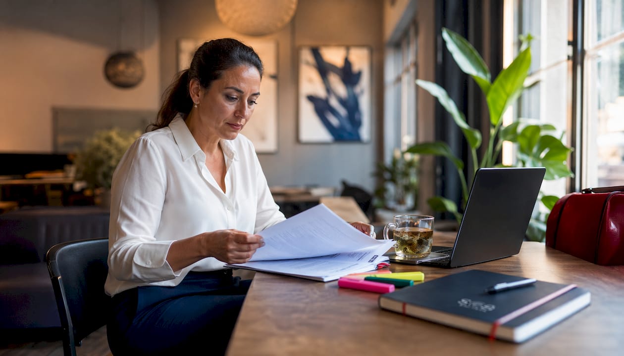Retail IT manager reviewing uptime SLA documents