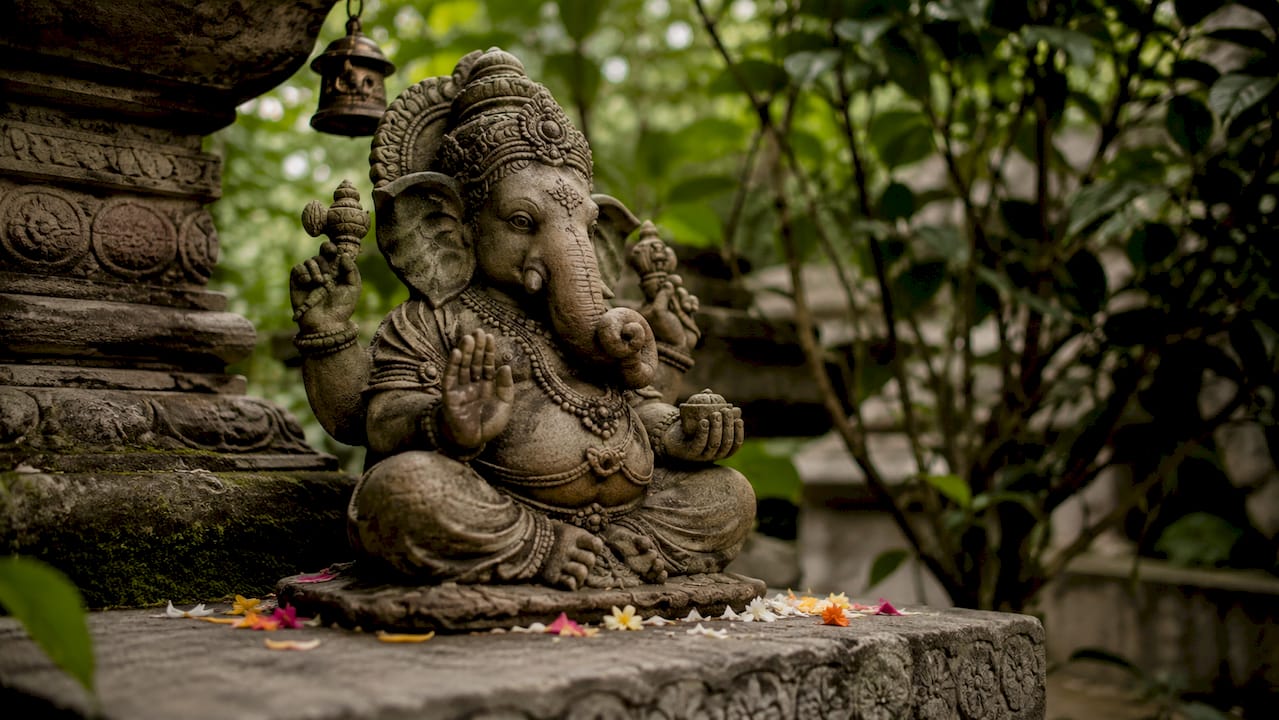 Close-up of Ganesh statue with symbolic features