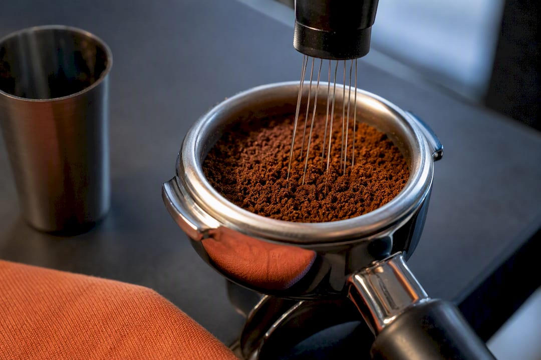 WDT needles stirring espresso grounds