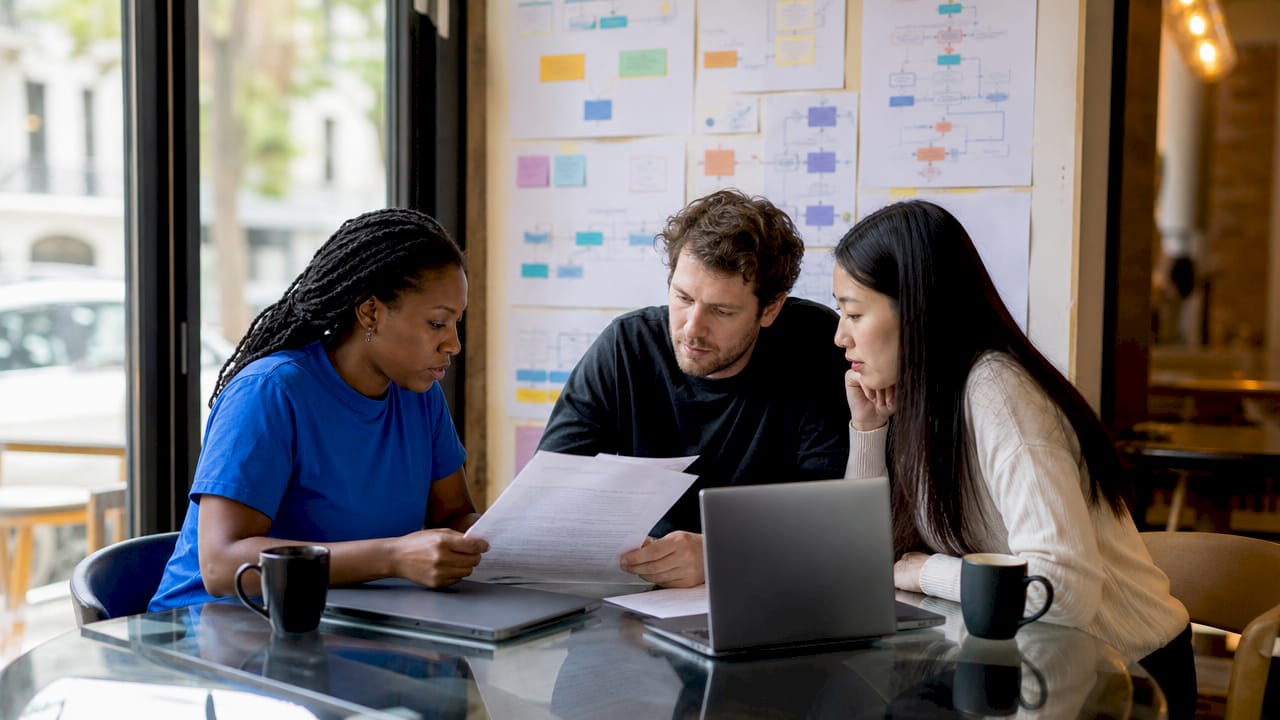 Developers collaborating on build cycle