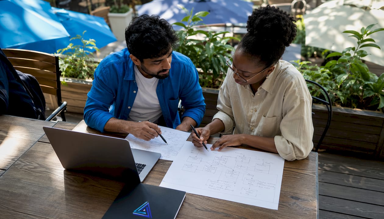 Engineers collaborating on legacy code issues