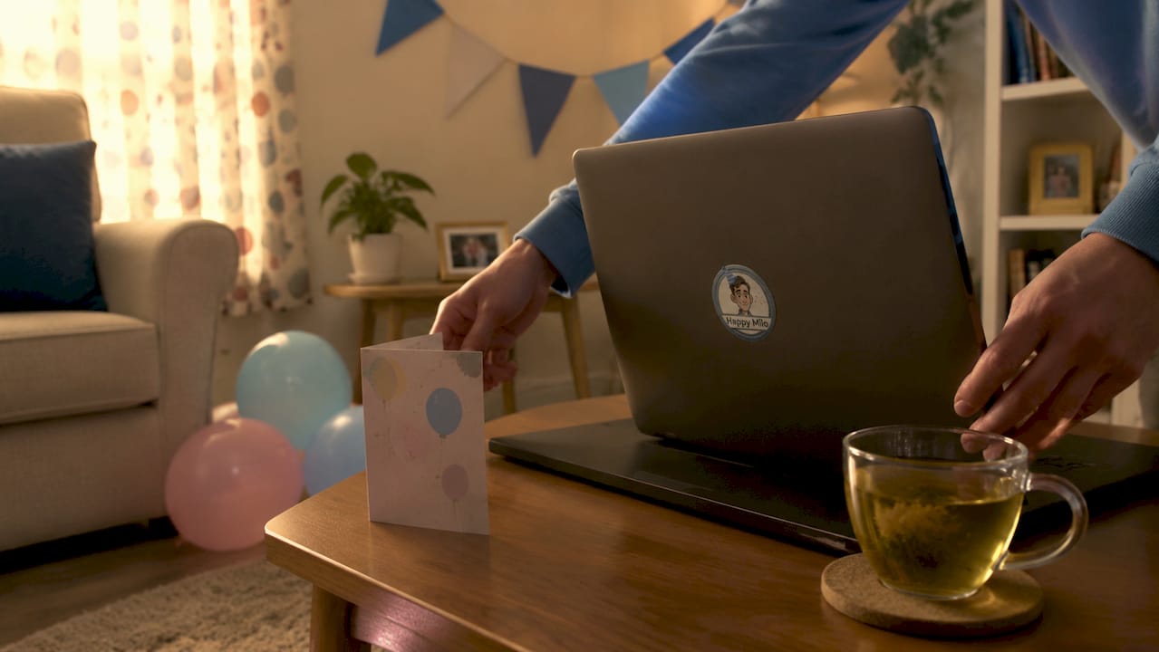 Person setting up laptop for virtual party
