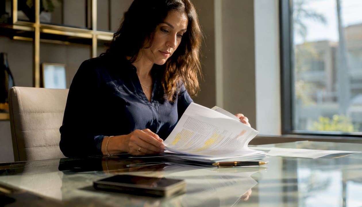 Notary reviewing real estate documents