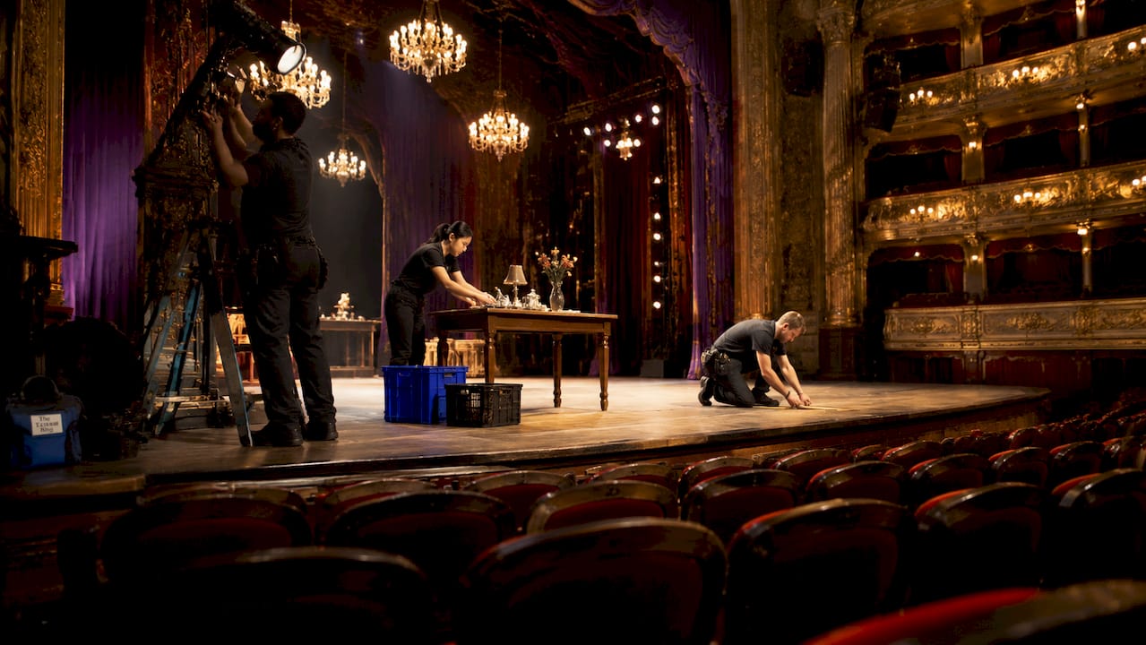 Stage crew preparing Broadway theater stage