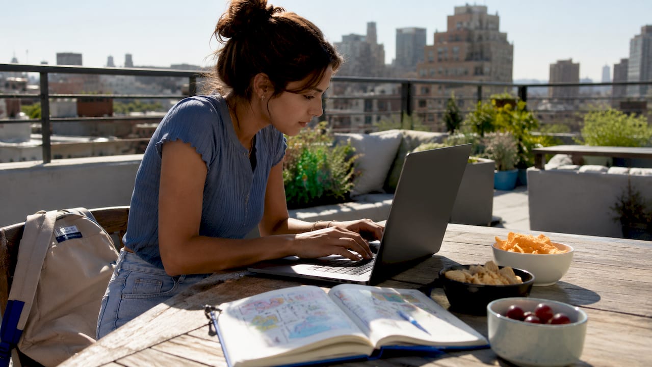 Woman browsing ticket promo codes on laptop