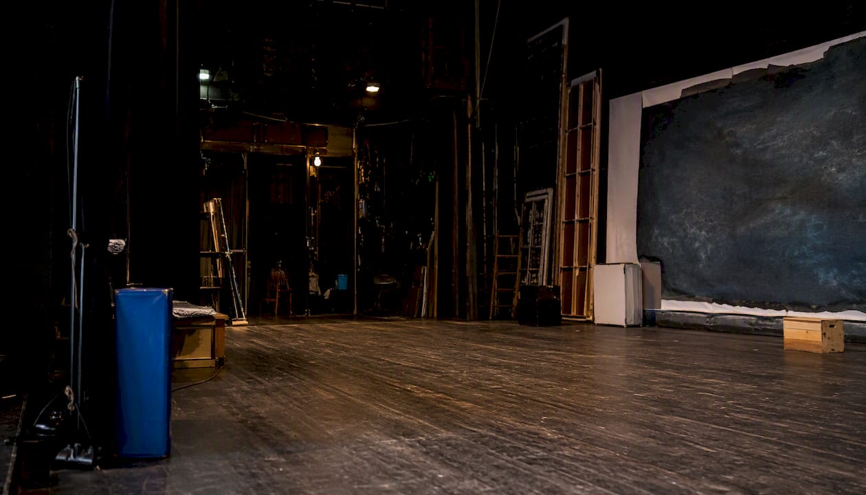 Empty regional theater stage with set construction
