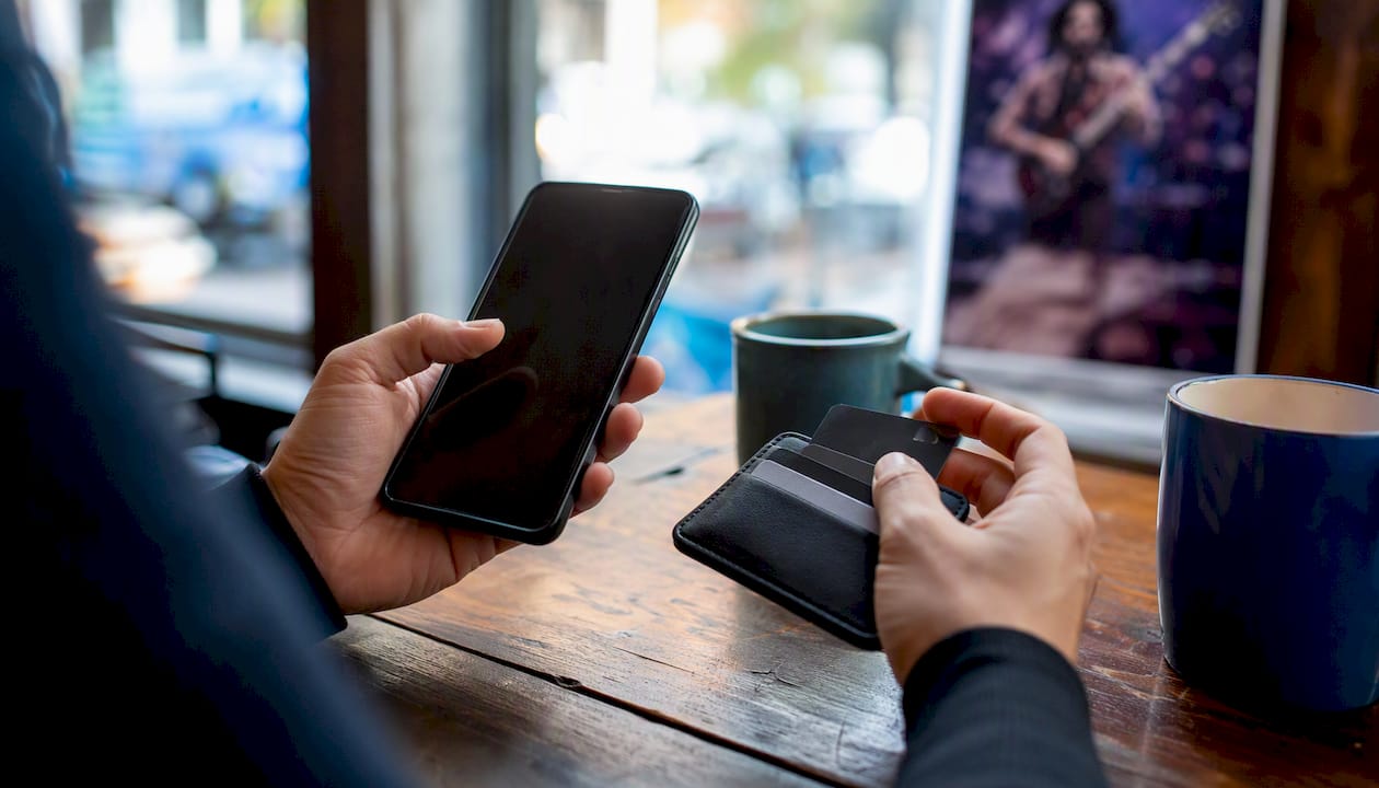 Hands preparing devices for presale ticket buying