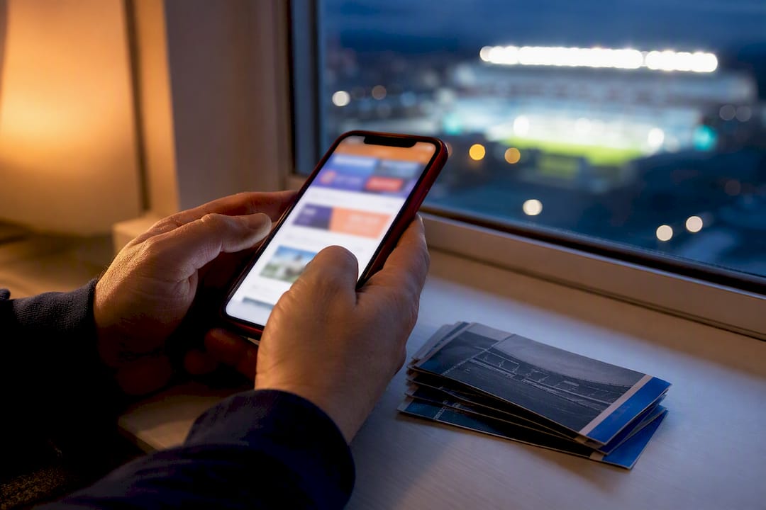Fan checking NFL resale ticket timing