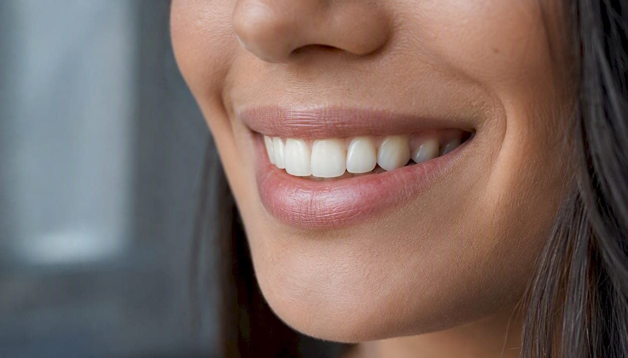 Close-up natural smile for photo consistency