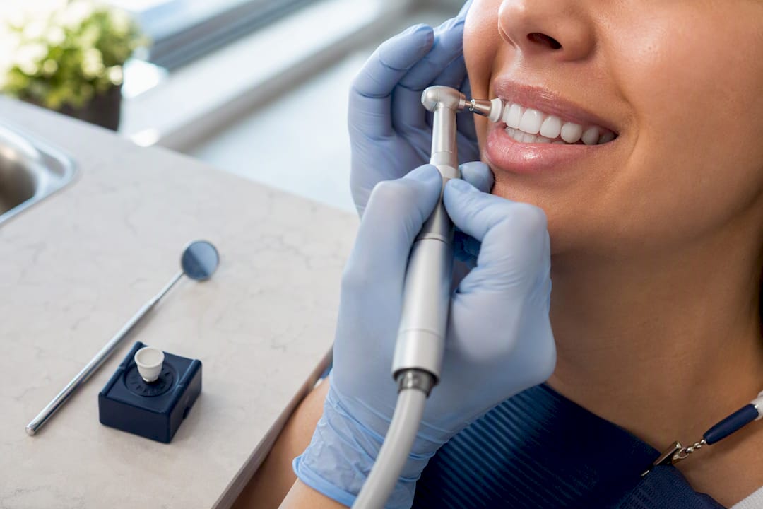 Dental cleaning before whitening treatment