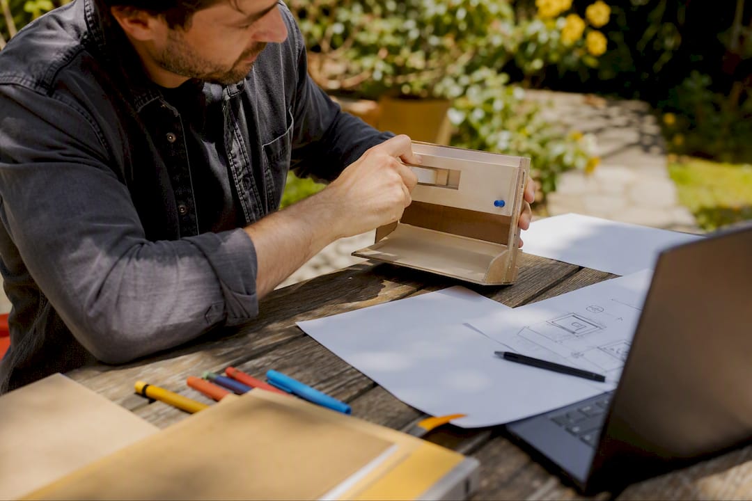 Hands demonstrating a prototype feature