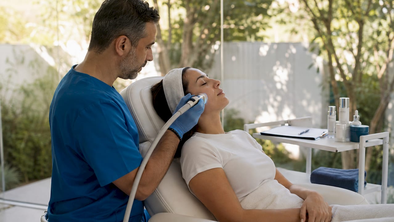 Dermatologist performing laser skin resurfacing