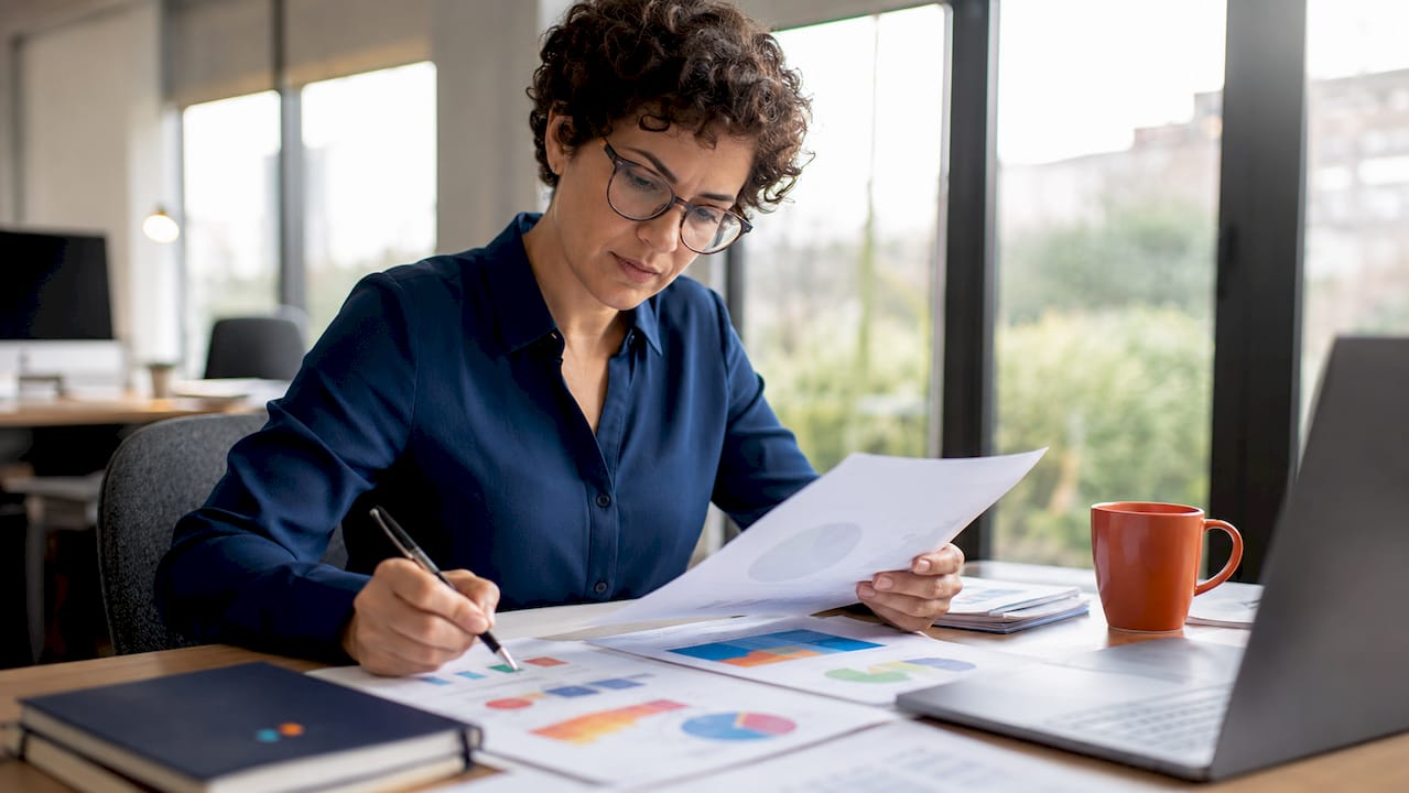 Marketer reviewing Google Ads budget reports
