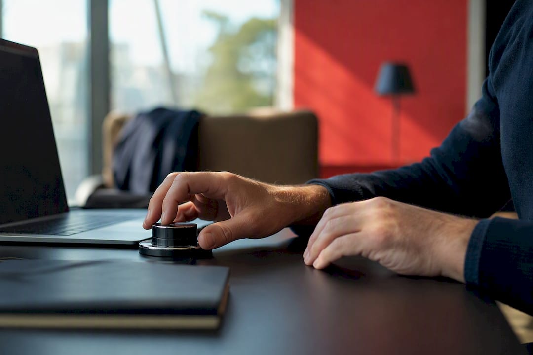 Hands adjusting marketing campaign dial