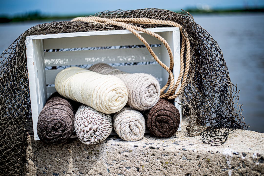 Close-up of plied wool yarn skeins and texture