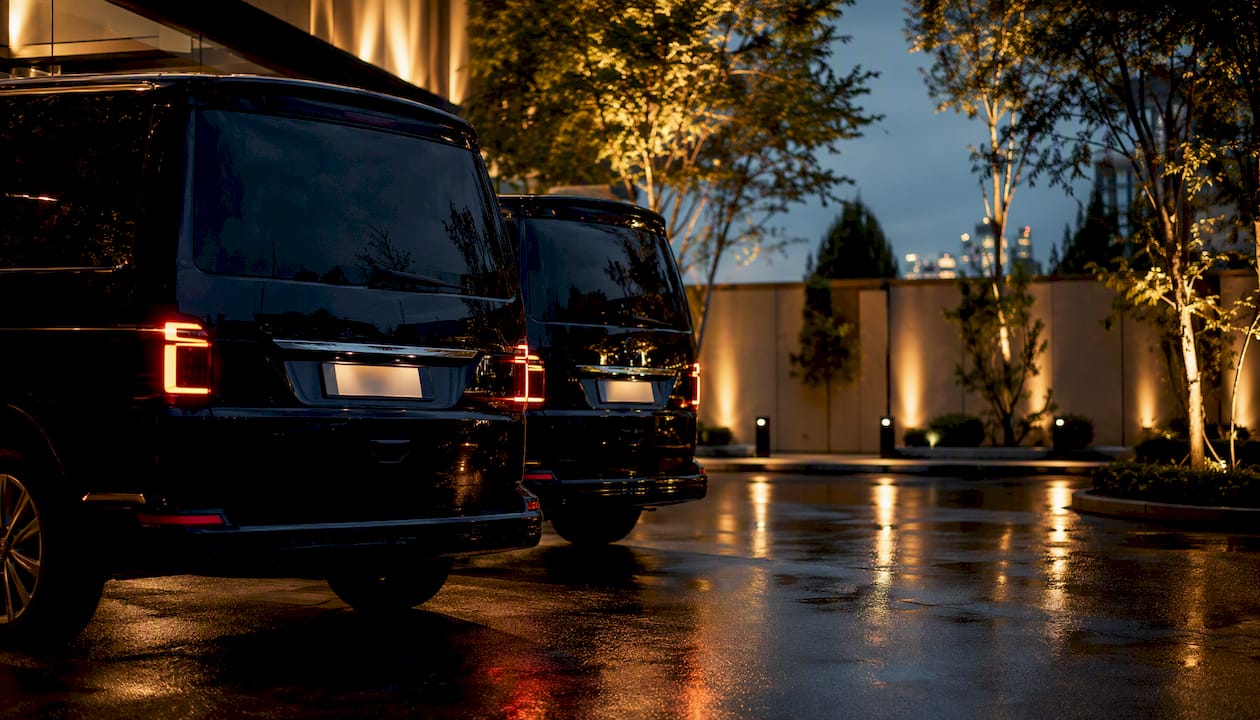 Two production shuttles parked at dusk