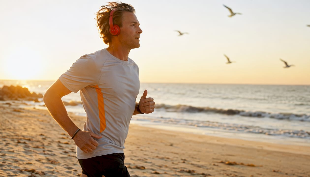Man jogging in urban park for fitness