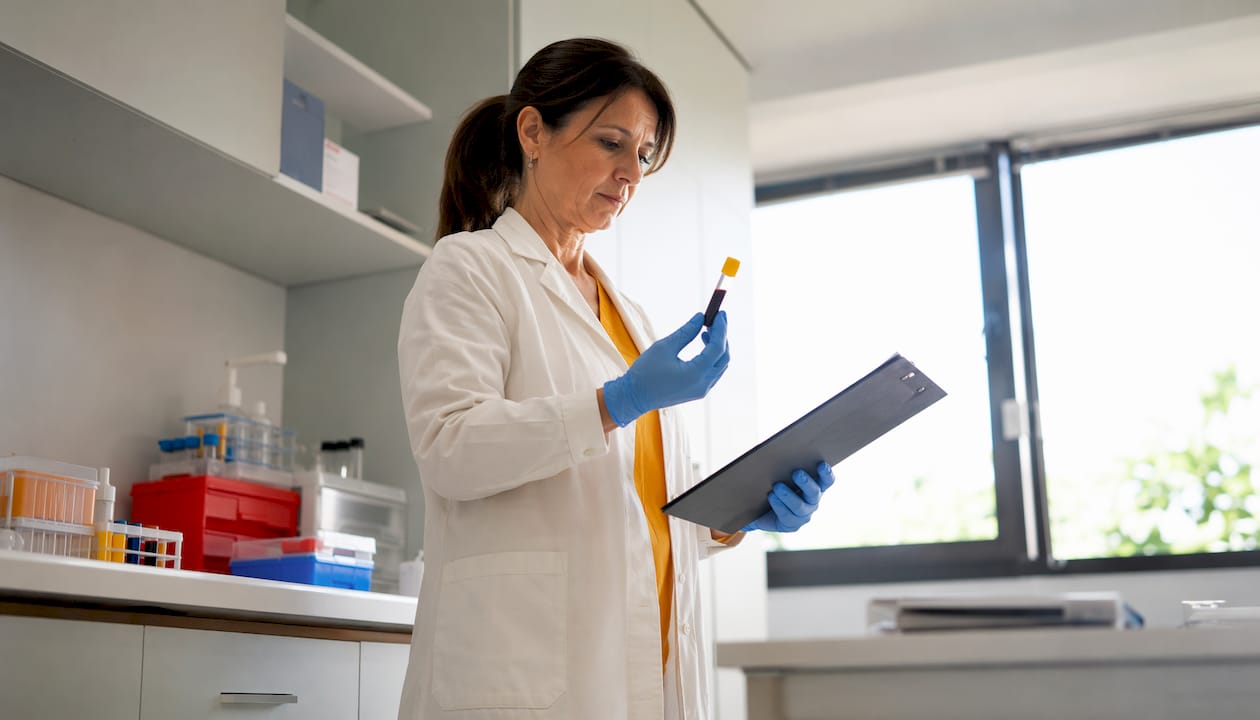 Healthcare worker handling fertility vitamin D test sample