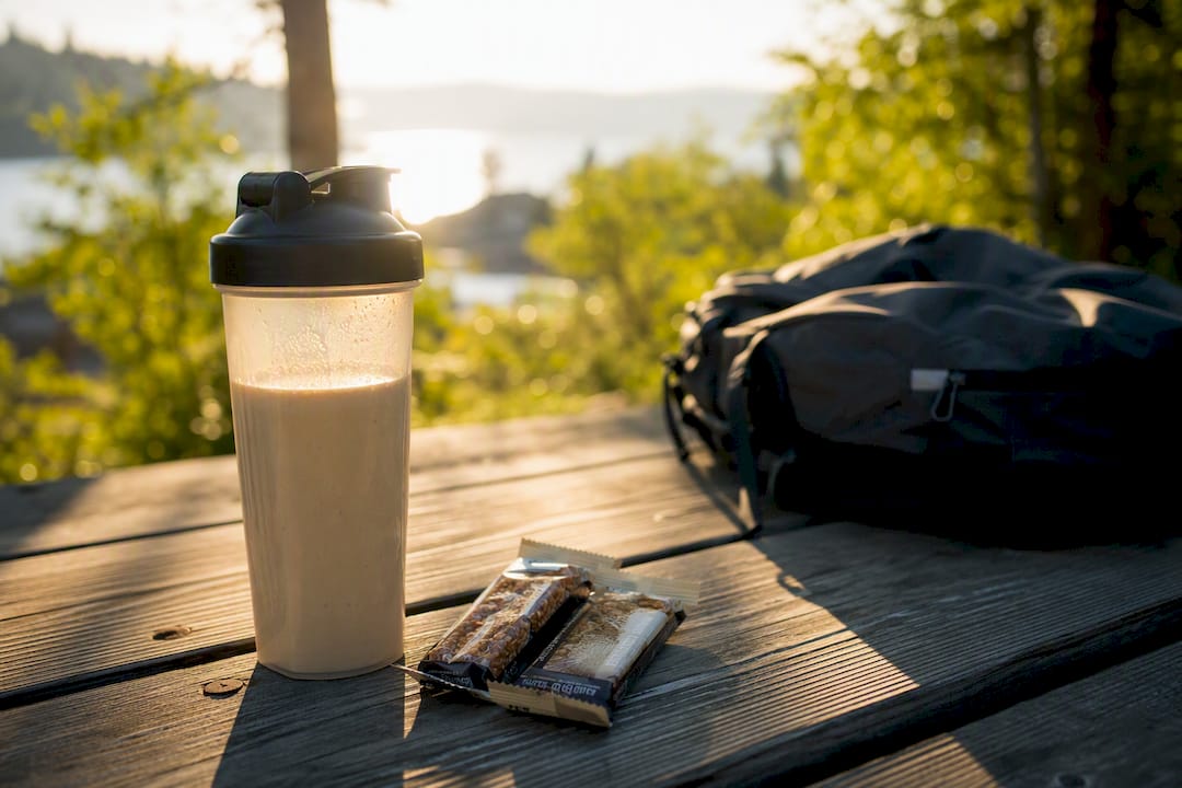 Vegan protein shake on travel desk