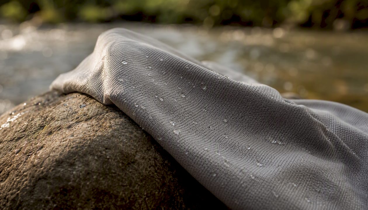 Close-up of moisture-wicking fabric texture on driftwood