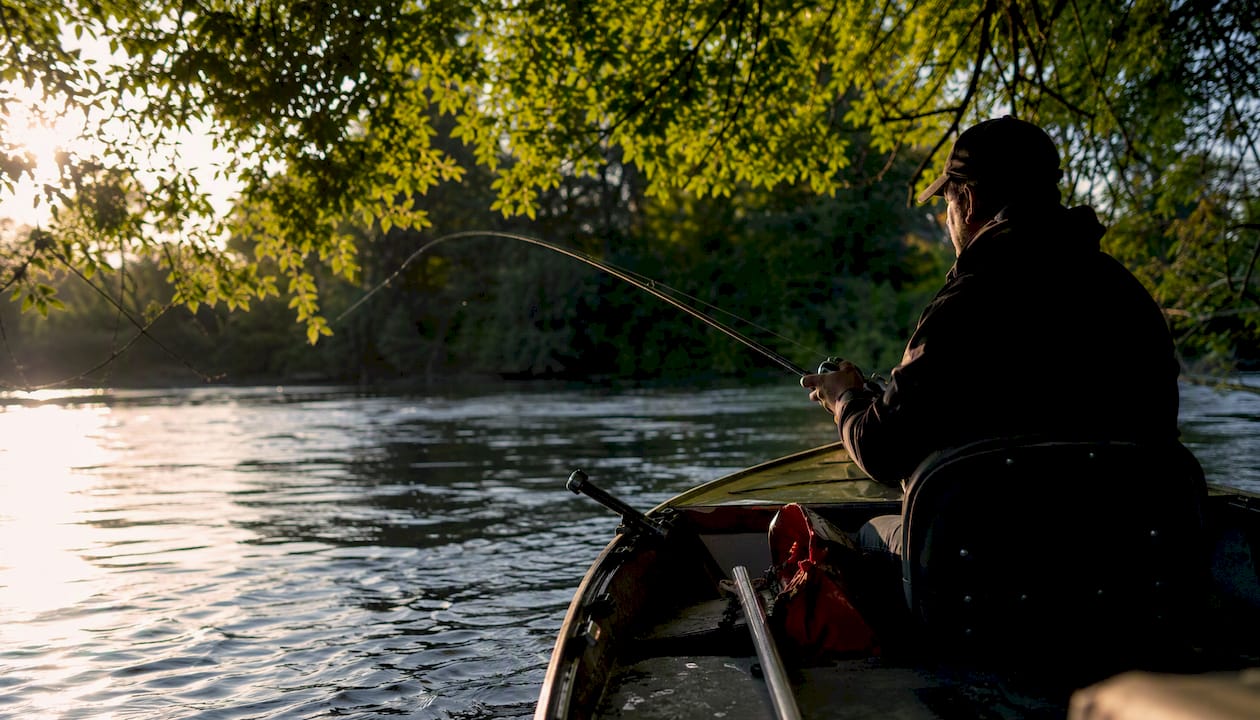 Boat back-trolling upstream on the Willamette River