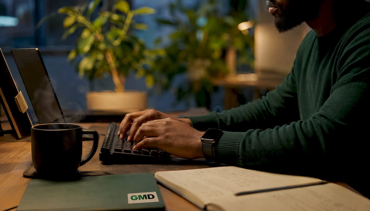 Hands typing at keyboard on AI metrics