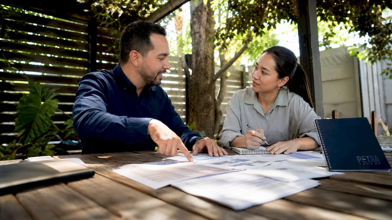 Two project managers collaborating in meeting room