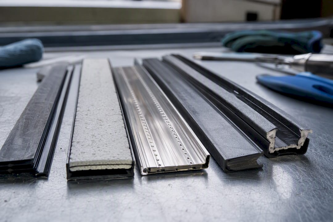 Close-up comparison of window spacer materials