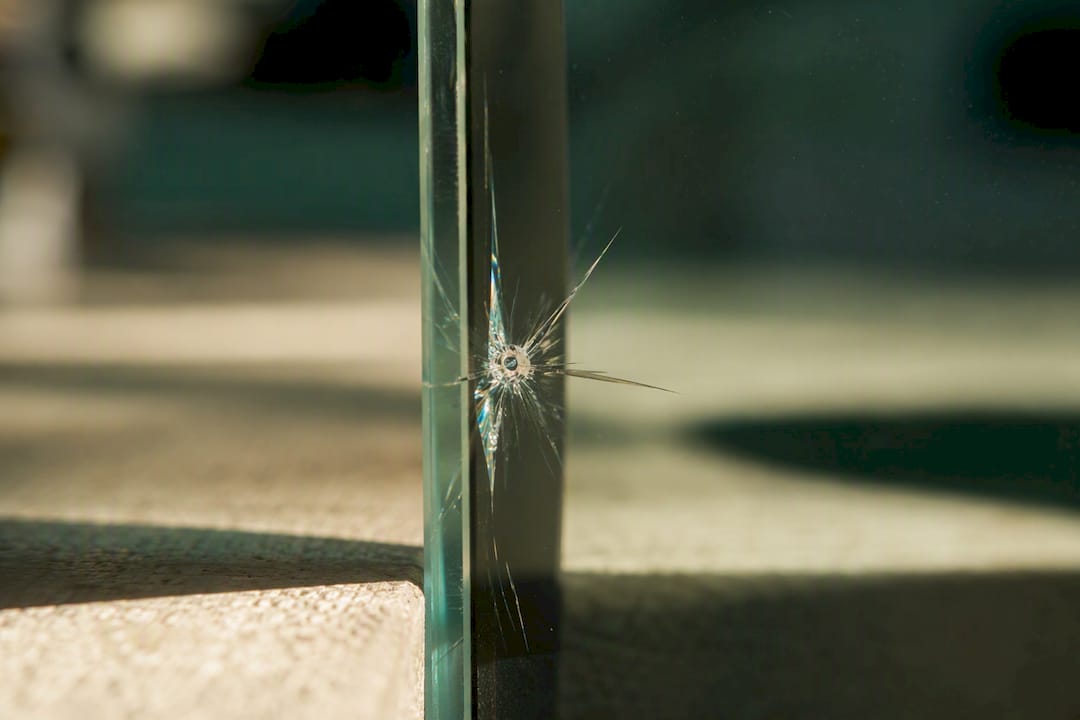 Macro of glass chip from nickel sulfide inclusion