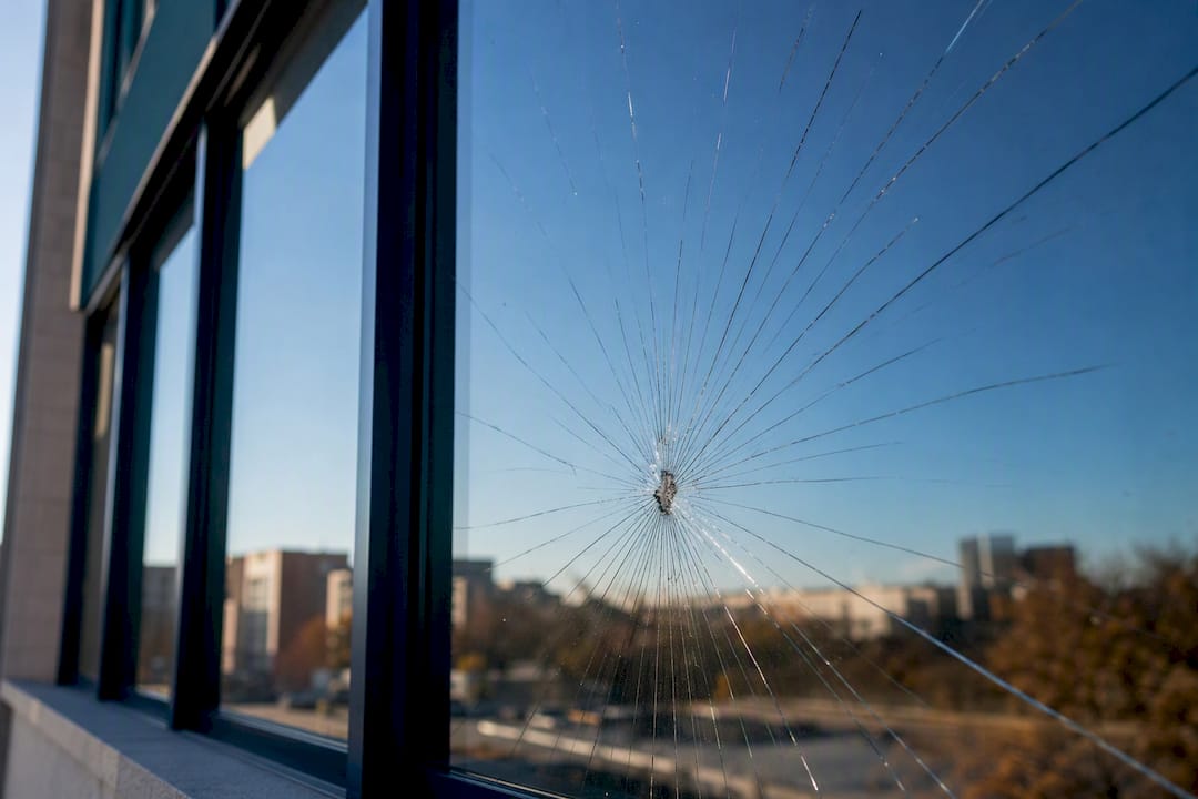 Glass pane shattered by debris impact