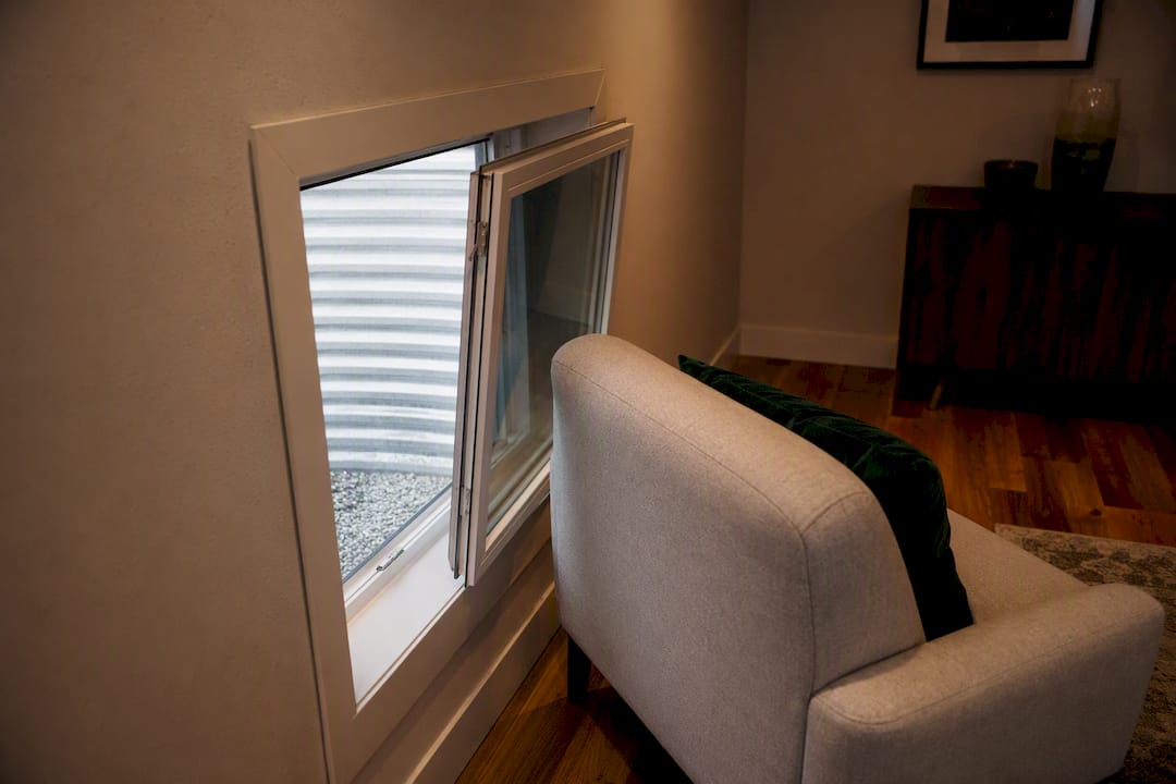 Furniture blocking casement egress window swing
