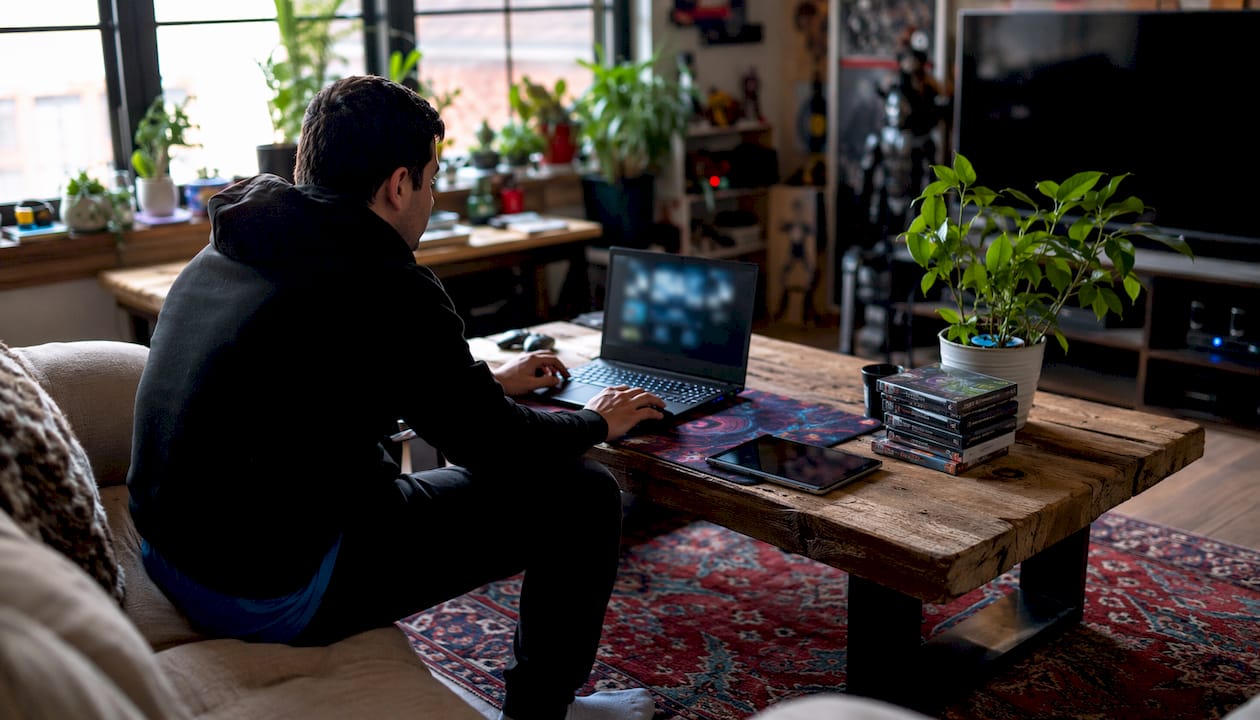 Overhead view of laptop and gaming accessories