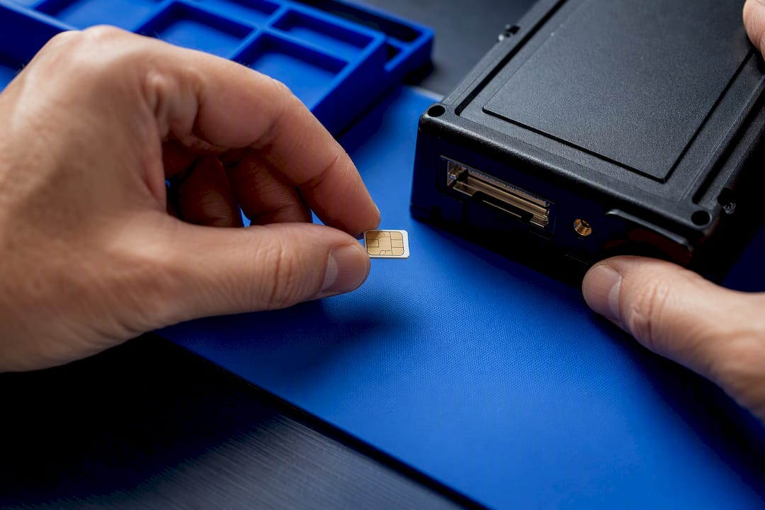 IoT SIM beside telematics device slot