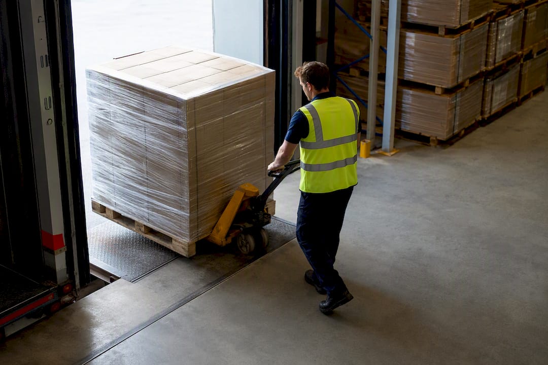 Pallet being unloaded at distribution dock