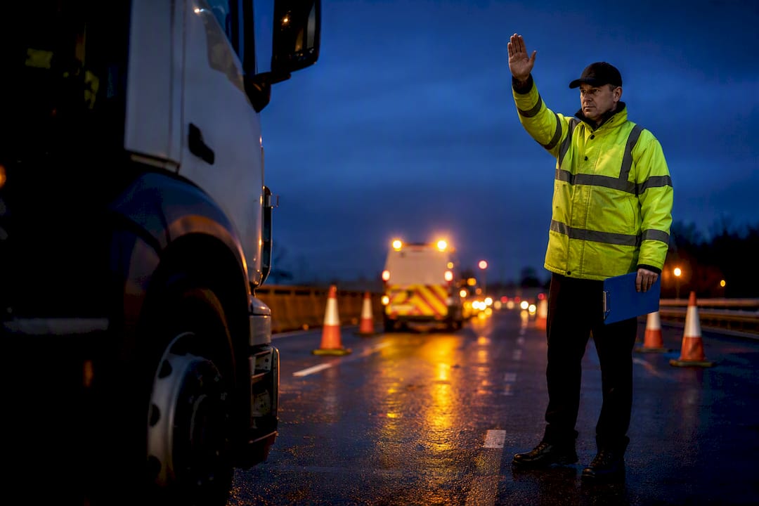 Commercial vehicle entering roadside compliance checkpoint