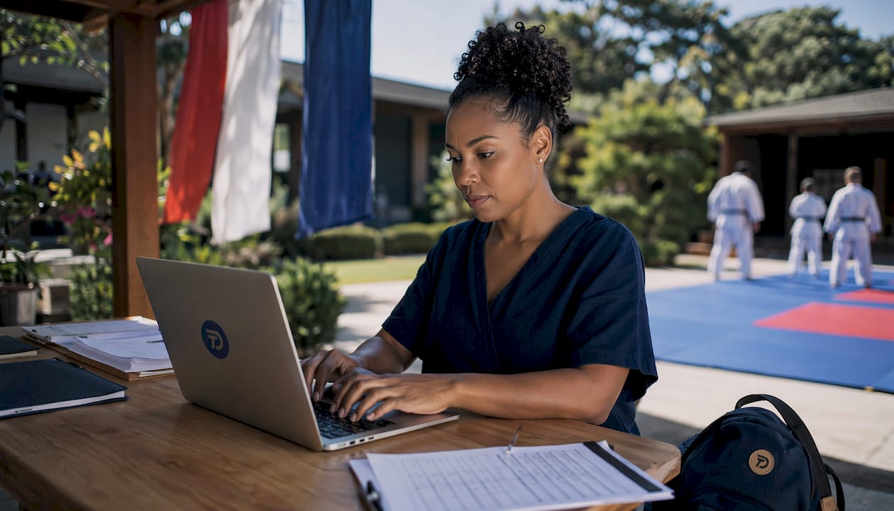 Martial arts admin staff managing billing workload