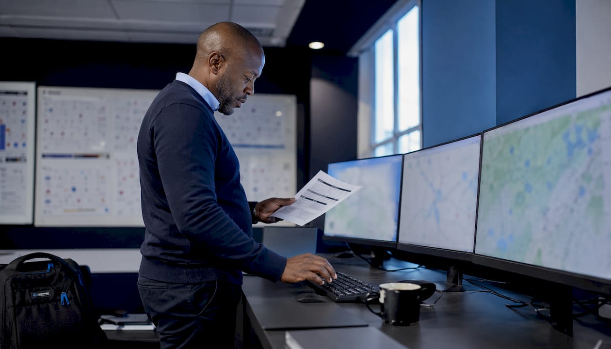 Man monitoring haulage GPS and SLA screens
