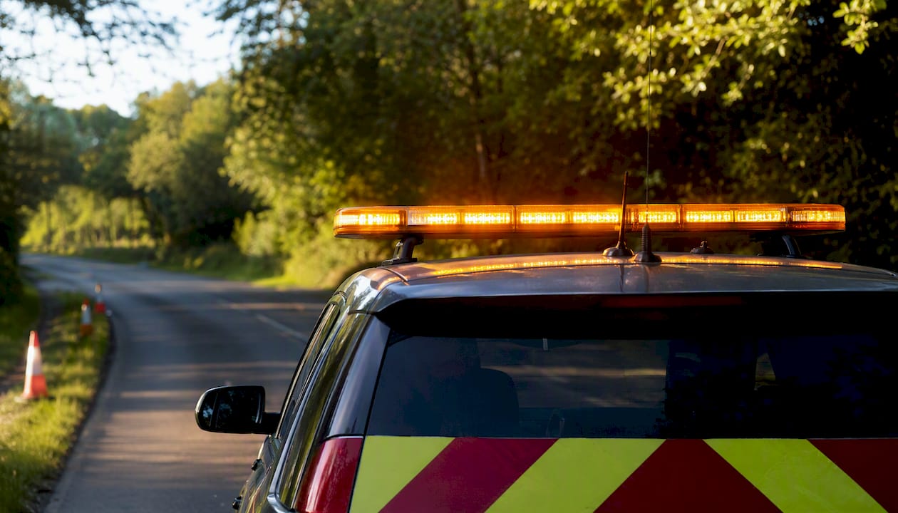 UK escort vehicle amber beacon and chevron close-up