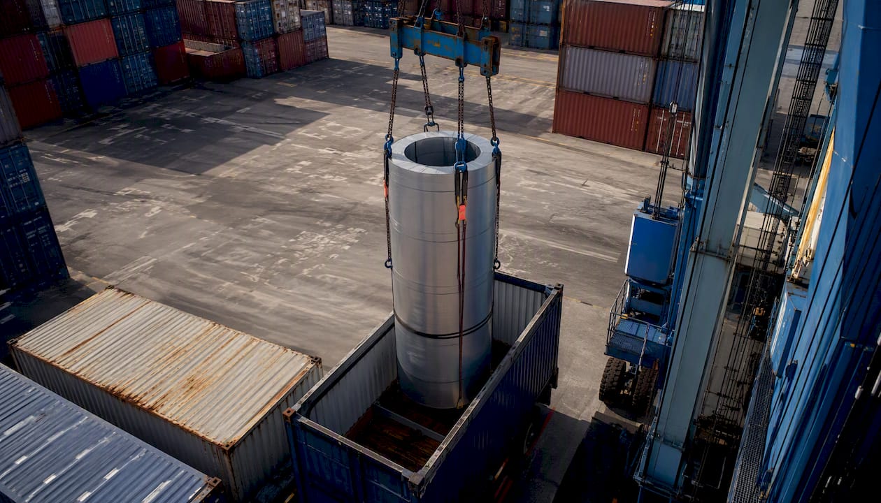 Open-top container loaded with tall coil at UK port