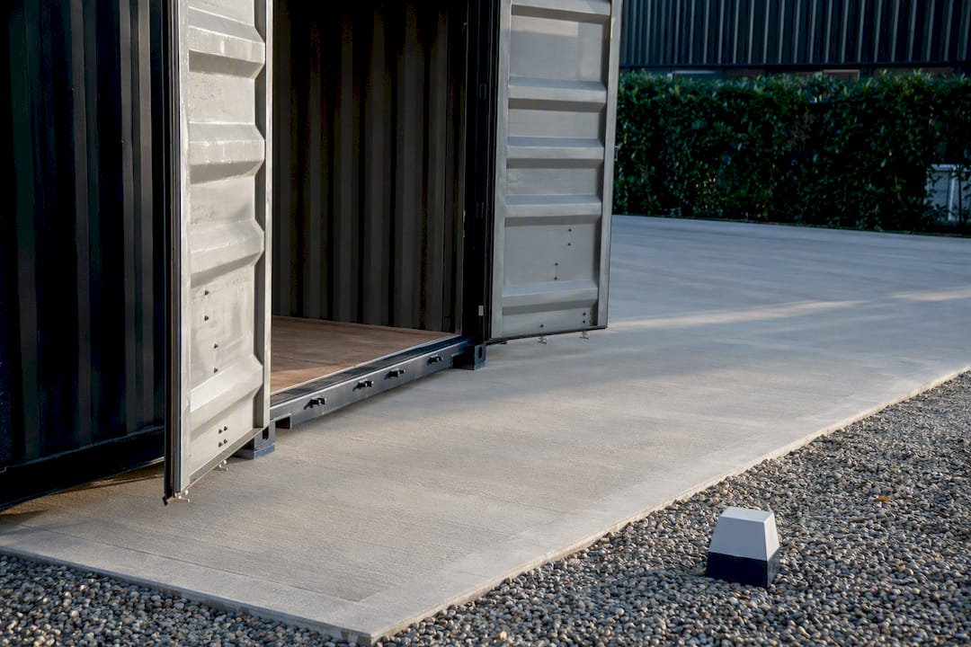 Clear space beyond container doors on concrete pad