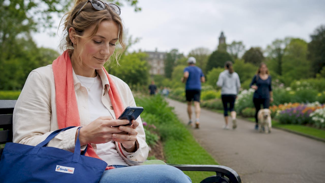 Young woman viewing rental listings outside Dublin home