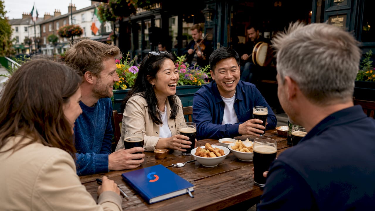 Group socializing in Irish pub interior