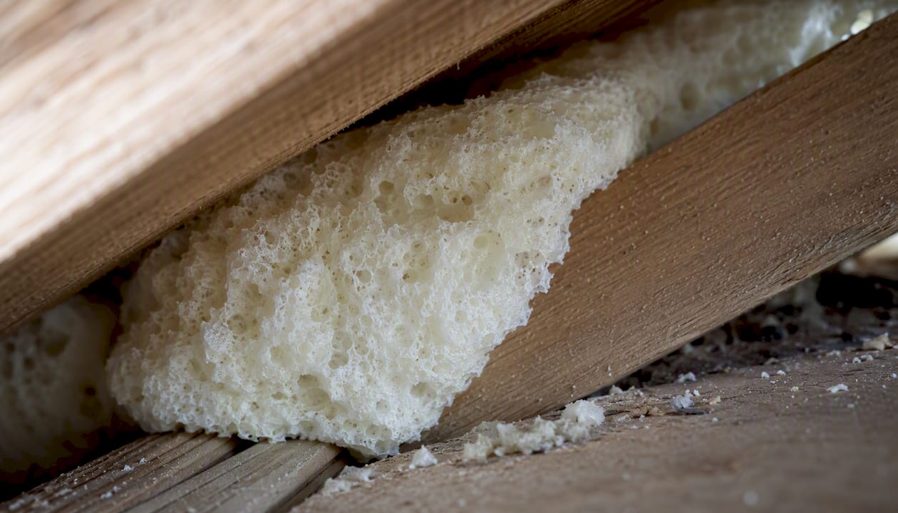 Open-cell spray foam insulation texture close-up