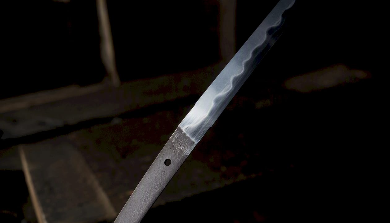 Katana blade tang and visible clay tempering hamon