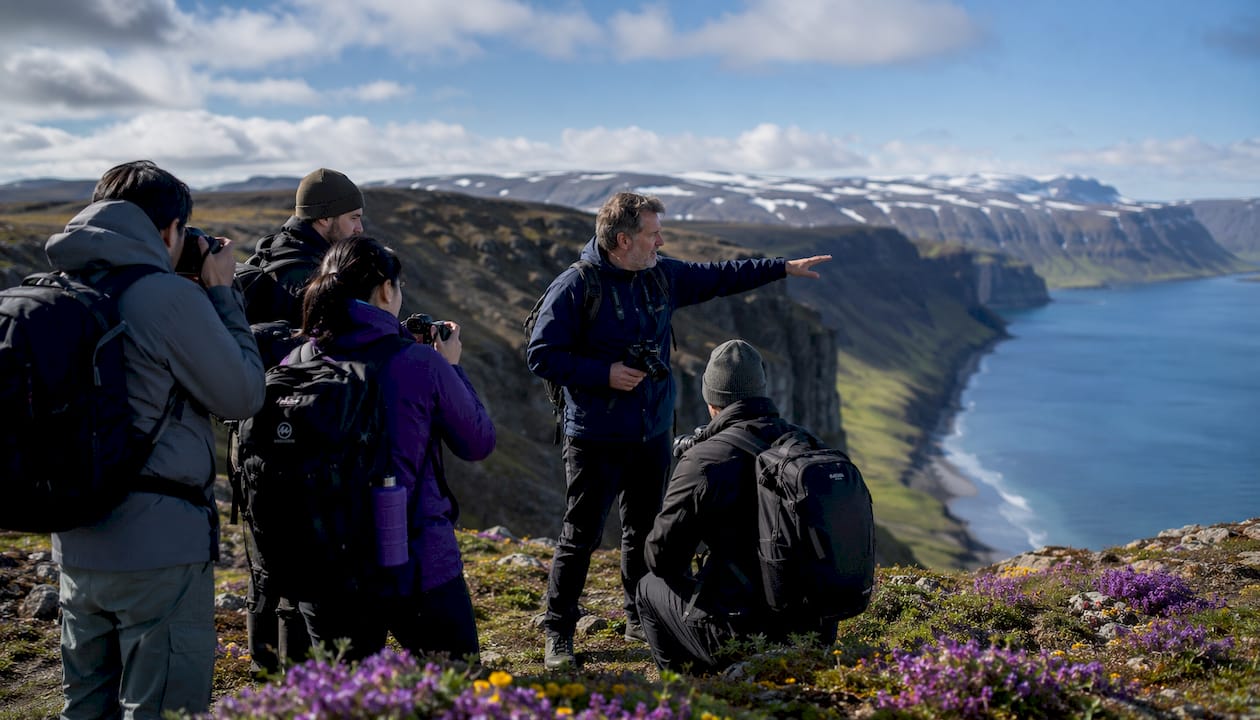 Small group photo tour near Iceland waterfall