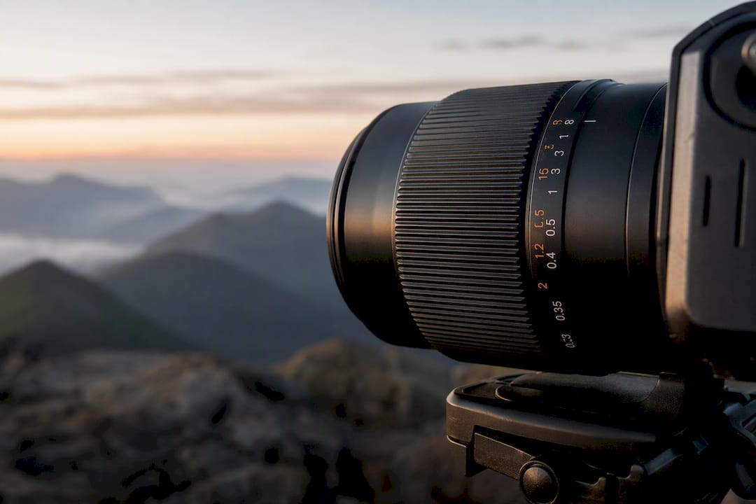 Close-up of camera lens focus ring distance scale