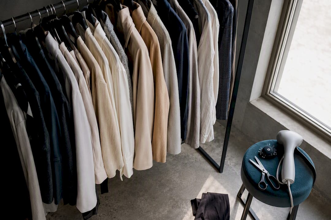Wardrobe fitting room with garments and tools